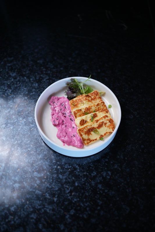 Grilled Halloumi with beetroot tzatziki sauce